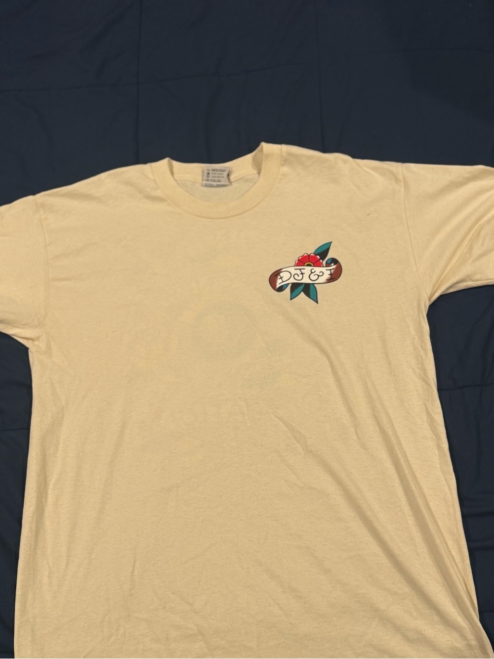 Men's Cream Graphic Tee with Small Chest Tattoo Print